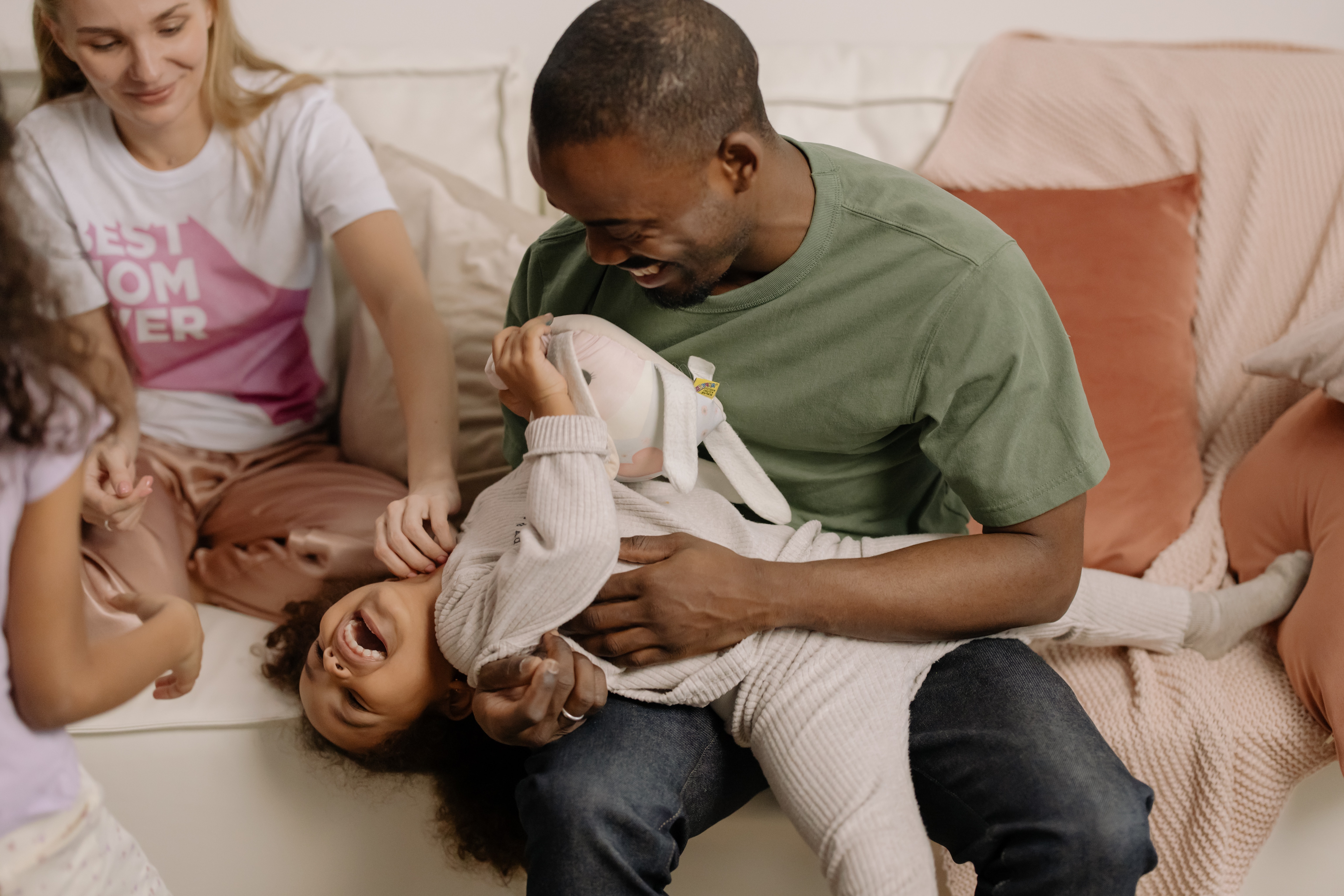 father playing with kids